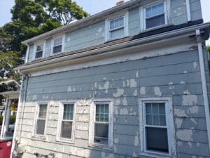 Home in need of siding replacement